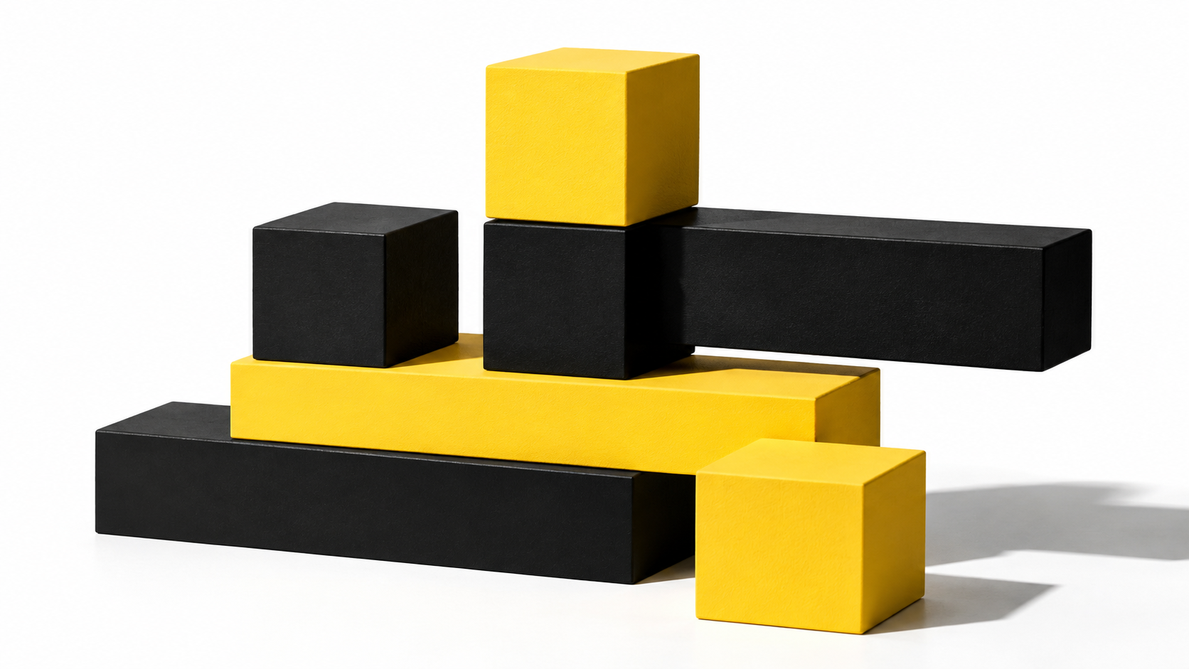 Stacked geometric blocks in black and yellow